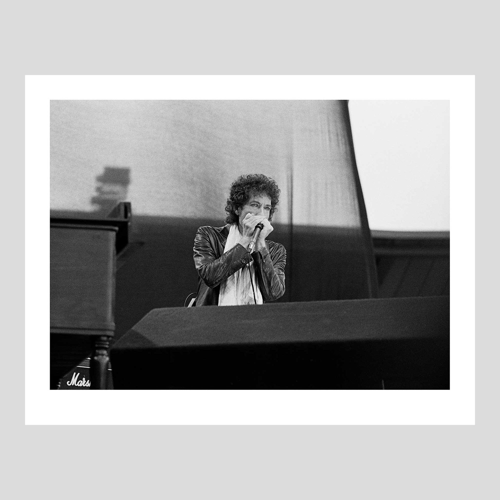 Bob Dylan performing at Ullevi, Sweden, Jun 09, 1984 , shot by Johan Ödmann. Original film negative digital printed using archival pigment ink on archival cotton based paper.  Rock Lumiere Editions offer beautiful Rock Photography Posters and Limited Edition Fine Art Prints in different sizes. Order your favorite music photography today. Worldwide shipping.