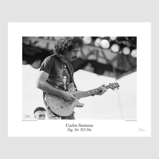 Carlos Santana with his first version of the PRS guitar on stage with Santana at Ullevi, Sweden, Jun 09, 1984. Photograph by Johan Ödmann. Rock Lumiere Editions offer beautiful Rock Photography Posters and Limited Edition Fine Art Prints of legendary artists and bands.  Order today. Worldwide shipping.