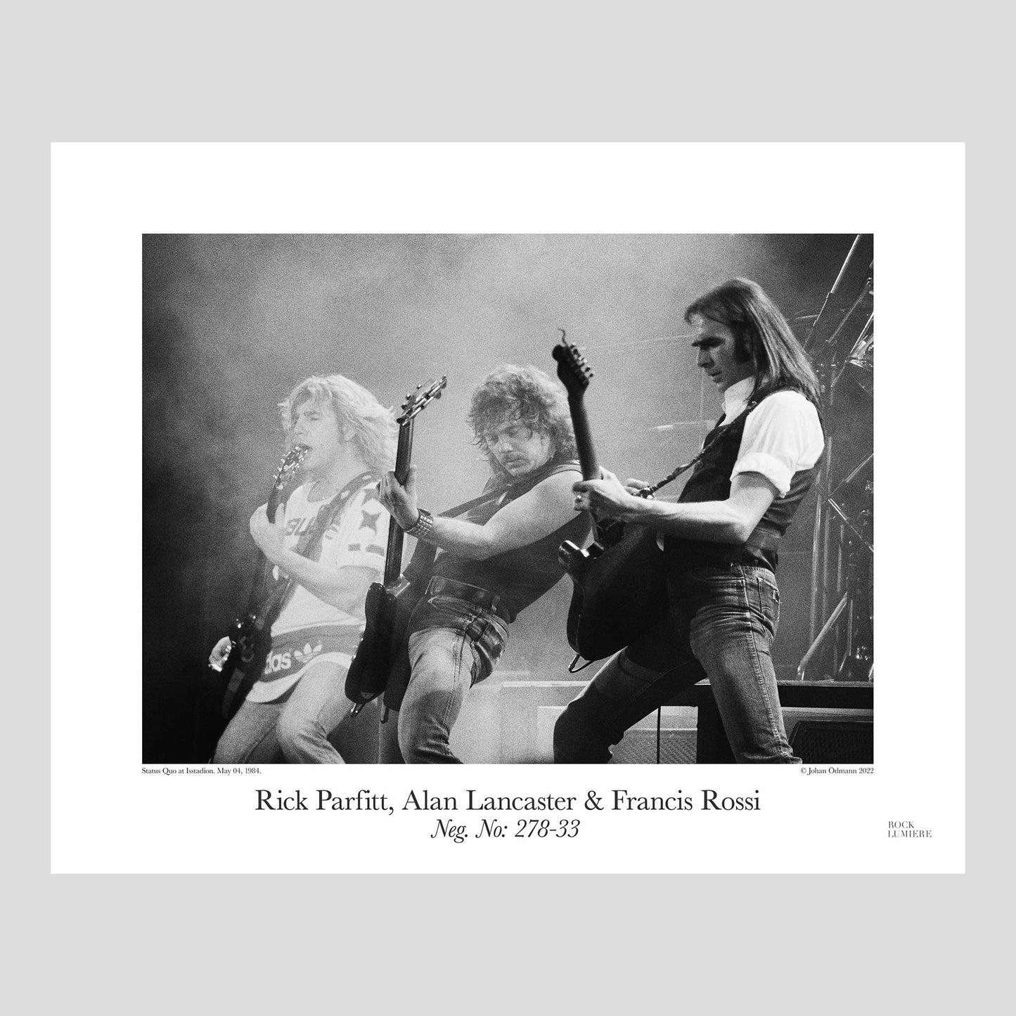 Status Quo with Rick Parfitt, Alan Lancaster & Francis Rossi on stage at Isstadion, Sweden, May 04, 1984. Photography by Johan Ödmann. Rock Lumiere Editions offer beautiful Rock Photography Posters and Limited Edition Fine Art Prints.  Choose among unique b/w photographs of legendary artists and bands.  Rock, Classic Rock, Swedish Garage Rock, Heavy Metal, NWOBHM, Goth, Pop, Blues, Paisley Underground. Order today. Worldwide shipping.