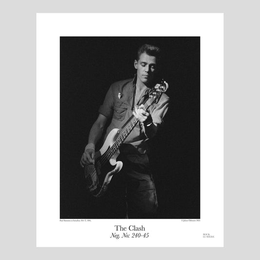 Paul Simonon with his battered iconic Fender bass on stage with The Clash at Isstadion, Sweden, Feb 17, 1984. Photograph by Johan Ödmann. Rock Lumiere Editions offer beautiful Rock Photography Posters and Limited Edition Fine Art Prints of iconic artists and bands. Order today. Worldwide shipping.